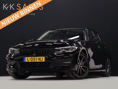 Zwart Occasion 2021 BMW 320e Sport Line Stationwagen | € 24.635 (Eerlijke prijs)