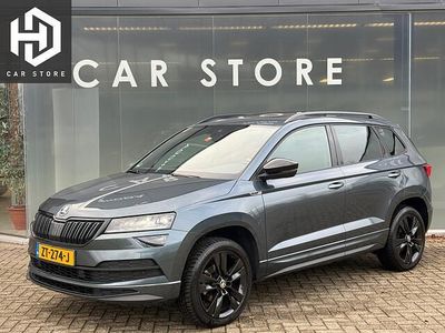 Grijs (metallic) Occasion 2019 Skoda Karoq SportLine SUV | € 22.900 (Eerlijke prijs)