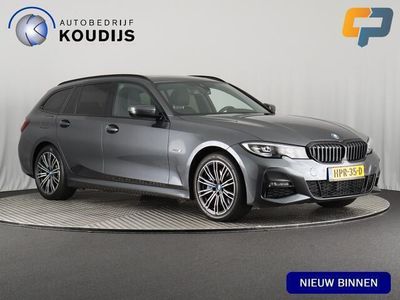 Grijs Occasion 2022 BMW 330 M Sport Stationwagen | € 30.990 (Eerlijke prijs)