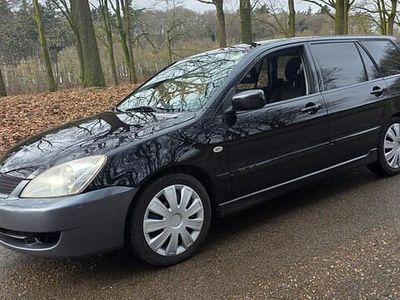 Occasion Mitsubishi Lancer Intense 135 PK (99 kW) 2009 Zwart Stationwagen