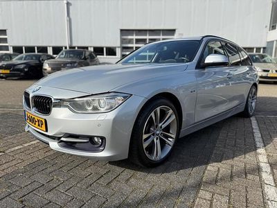 Grijs Occasion 2015 BMW 325 Executive Stationwagen | € 7.950
