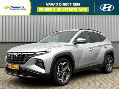 Shimmering silver (grijs metallic) Gebruikt 2021 Hyundai Tucson Premium SUV | € 30.735 (Eerlijke prijs)