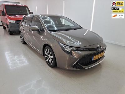 Bruin (metallic) Occasion 2021 Toyota Corolla Business Edition Stationwagen | € 20.899 (Eerlijke prijs)