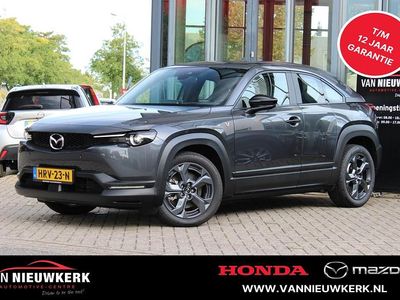 Machine grey (grijs metallic) Gebruikt 2025 Mazda MX30 Exclusive-Line SUV | € 28.400