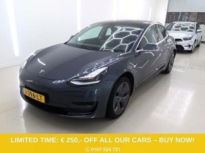 Grijs (metallic) Occasion 2020 Tesla Model 3 Standard Range Sedan | € 16.900 (Eerlijke prijs)