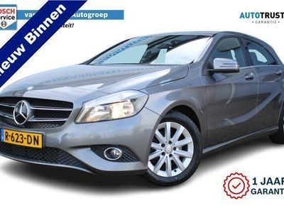 tweedehands Mercedes A180 | Incl. 1 jaar Garantie | Navigatie | Airco | Stoelverwarming | Trekhaak afneembaar | Zwarte hemelbekleding | 16 Inch LMV | Centrale vergrendeling met afstandsbediening | Half lederen bekleding |