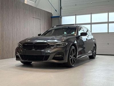 Grijs Gebruikt 2020 BMW 330e Executive Stationwagen | € 33.990 (Eerlijke prijs)