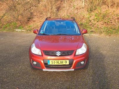 Oranje (metallic) Gebruikt 2010 Suzuki SX4 Exclusive MPV | € 2.990