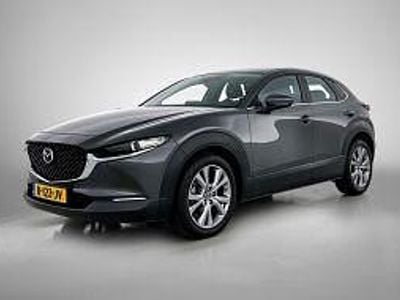Machine gray (donker grijs metallic) Gebruikt 2022 Mazda CX-30 Comfort SUV | € 28.945 (Eerlijke prijs)