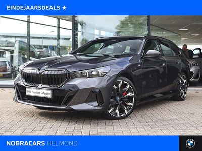 Grijs Gebruikt 2025 BMW 550e M Sport Stationwagen | € 89.750 (Eerlijke prijs)