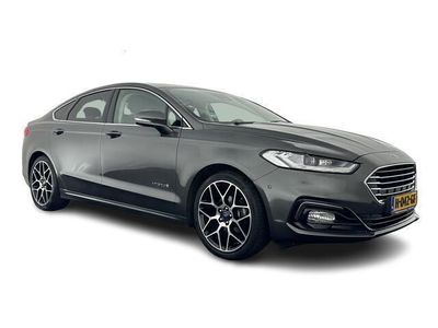 tweedehands Ford Mondeo 2.0 IVCT HEV Titanium (INCL-BTW) *VOLLEDER | FULL-LED | BLIND-SPOT | SONY-AUDIO | MEMORY-PACK | LANE-ASSIST | ADAPTIVE-CRUISE | CAMERA | KEYLESS | NAVI-FULLMAP | ECC | PDC | COMFORT-SEATS | 19"ALU*