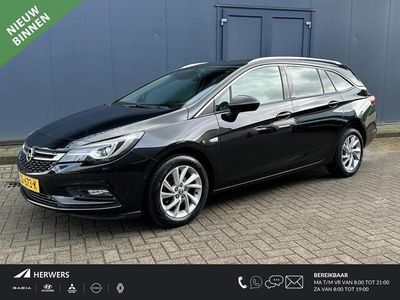 tweedehands Opel Astra Sports Tourer 1.4 Innovation / Trekhaak / Cruise Control Adaptief / Camera / Navigatie / Climate Control / Keyless Entry&Go / Dodehoek herkenning / Bluetooth / DAB