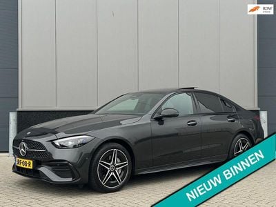 Grijs Gebruikt 2022 Mercedes C300e AMG Sedan | € 43.490 (Eerlijke prijs)