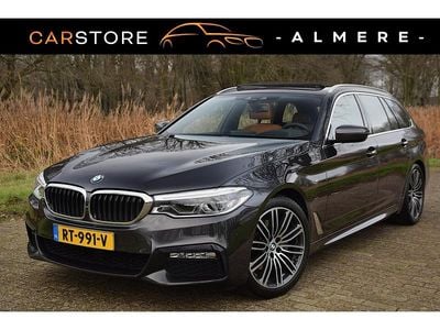 Grijs Occasion 2018 BMW 520 Executive Stationwagen | € 25.450 (Iets duurder)