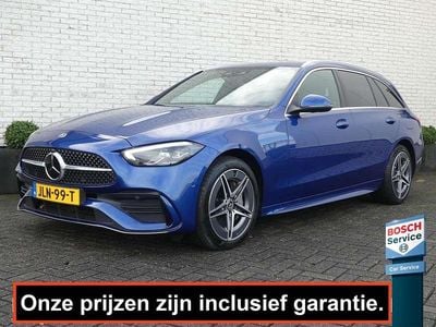 Blauw Gebruikt 2022 Mercedes C300e AMG line Stationwagen | € 34.900 (Goede deal)