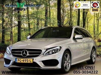 tweedehands Mercedes 180 C-KLASSE EstateBusiness Solution AMG | Panoramadak | Elektrische Trekhaak | Achteruitrijcamera | Parkeersensoren | Stoelverwarming | Lederen Bekleding | Cruise Control |