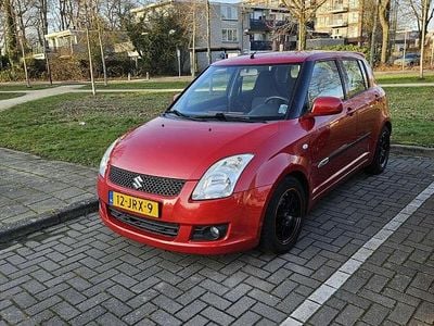 Occasion Suzuki Swift 92 PK (67 kW) 2009 Rood Sedan