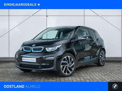 Fluid black met accent bmw i blau (donker zwart metallic) Gebruikt 2022 BMW i3 Hatchback | € 22.950 (Eerlijke prijs)