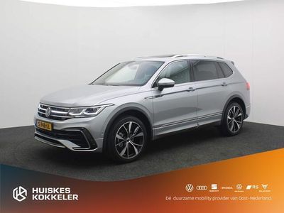 tweedehands VW Tiguan Allspace R-Line 7p. 1.5 TSI 150pk DSG Automaat Trekhaak, Panoramadak, 3e zitrij, Achteruitrijcamera, LED matrix koplampen, Adaptive cruise control, Stoelverwarming, Navigatie, Verwarmde voorruit, Parkeersensoren