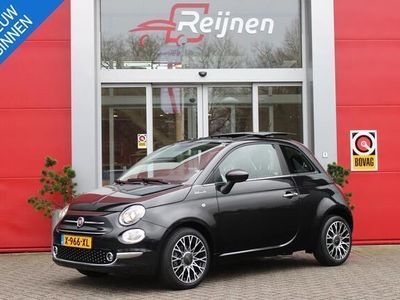 tweedehands Fiat 500 1.0 Hybrid 70PK DOLCEVITA | NAVIGATIE | PANORAMISCH SCHUIF/KANTEL DAK | APPLE CARPLAY/ANDROID AUTO | PARKEERSENSOREN | CRUISE CONTROL | LICHT/REGEN SENSOR | LICHTMETALEN VELGEN 16" "COLLEZIONE | HALF LEDEREN BEKLEDING | DIGITAAL INTRUMENTENPANEEL