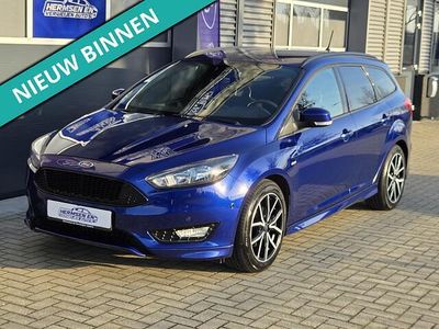 Blauw (metallic) Occasion 2018 Ford Focus ST-Line Stationwagen | € 11.950 (Goede deal)