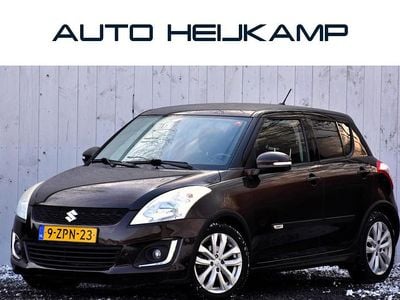Bruin Occasion 2015 Suzuki Swift Exclusive Hatchback | € 9.450 (Eerlijke prijs)