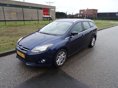 Blauw (metallic) Occasion 2013 Ford Focus Titanium Stationwagen | € 1.995 (Goede deal)
