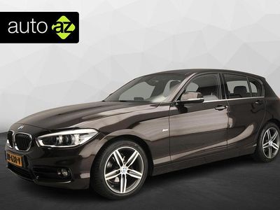 Bruin Occasion 2017 BMW 118 Sport Line Hatchback | € 15.900 (Eerlijke prijs)