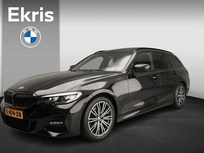Zwart Occasion 2021 BMW 318 M Sport Stationwagen | € 29.900 (Eerlijke prijs)