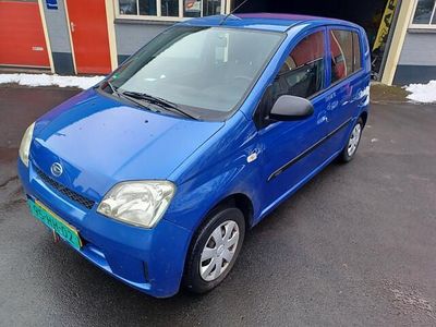 Occasion Daihatsu Cuore 59 PK (43 kW) 2005 Blauw Hatchback