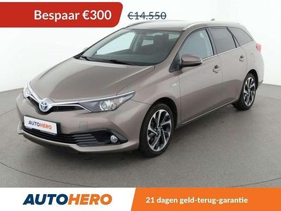 Bruin Occasion 2016 Toyota Auris Hybrid Design Stationwagen | € 14.449 (Goede deal)