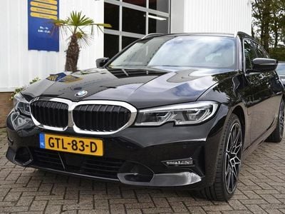 Zwart Occasion 2021 BMW 330e Executive Stationwagen | € 29.950 (Goede deal)
