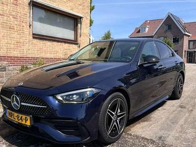Blauw Occasion 2023 Mercedes C300e AMG line Sedan | € 54.950