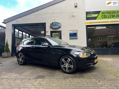 Zwart Occasion 2012 BMW 114 Sport Line Hatchback | € 7.450 (Eerlijke prijs)