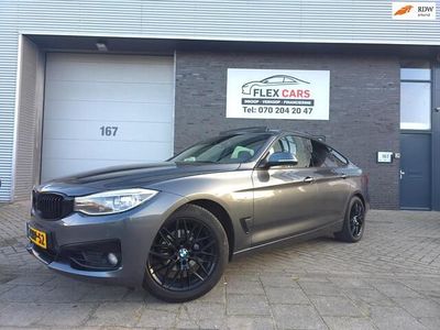 Grijs (metallic) Occasion 2014 BMW 320 Sport Line Hatchback | € 11.899 (Eerlijke prijs)