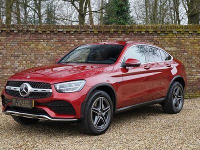 tweedehands Mercedes E300 GLC-KLASSE Coupé4Matic EQ Power First owner car, A very complete (many options) car, Very low mileage, VAT (BTW) deductible, Maintained by the official Mercedes Benz dealer, A beautiful color combination in red over black/red leather
