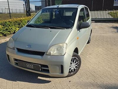 Occasion Daihatsu Cuore 59 PK (43 kW) 2003 Beige Hatchback