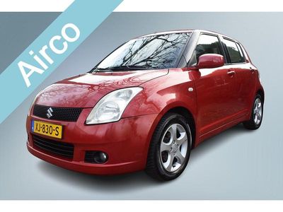 Rood (metallic) Gebruikt 2005 Suzuki Swift GLX Hatchback | € 1.950 (Eerlijke prijs)