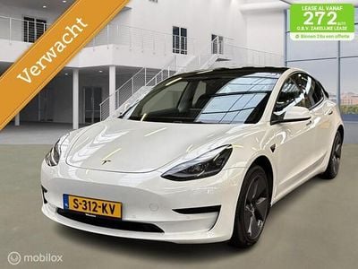 Wit (parellak) Gebruikt 2021 Tesla Model 3 Standard Range Sedan | € 20.295 (Eerlijke prijs)