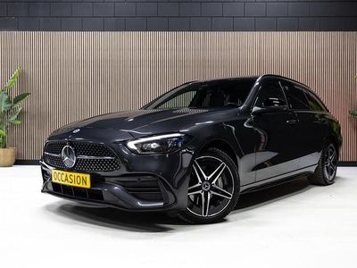 Grijs, metallic lak Occasion 2021 Mercedes C300e AMG line Stationwagen | € 39.950