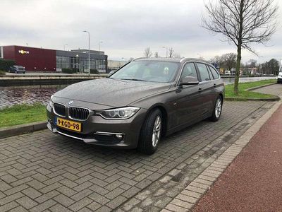 Bruin Occasion 2013 BMW 320 Stationwagen | € 7.950 (Iets duurder)