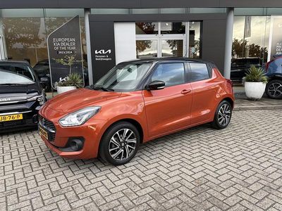 Oranje Occasion 2021 Suzuki Swift Style Hatchback | € 17.945 (Eerlijke prijs)