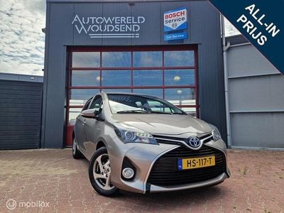 Bruin Occasion 2015 Toyota Yaris Hybrid Hatchback | € 10.995 (Eerlijke prijs)
