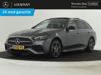 tweedehands Mercedes E300 C-KLASSE EstateAMG Line | Panoramadakk elect. | 5 Spaaks lichtmetalen velgen | Navigatie MBUX | Elect. bedienbare voorstoelen met memory | Alarm klasse 3 | Inclusief 24 maanden Certified garantie voor Europa.