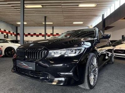 Occasion BMW 330e Executive 184 PK (135 kW) 2021 Zwart Stationwagen