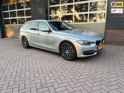 Grijs Occasion 2014 BMW 316 Executive Stationwagen | € 15.000 (Iets duurder)