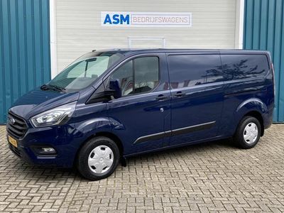 tweedehands Ford 300 TRANSIT CUSTOM2.0 105Pk TDCI L2H1 Trend / Cruise / Airco / DUBBELE SCHUIFDEUR / Navi / Trekhaak / Lease ¤302,- pm / Apk t/m 31-03-2025