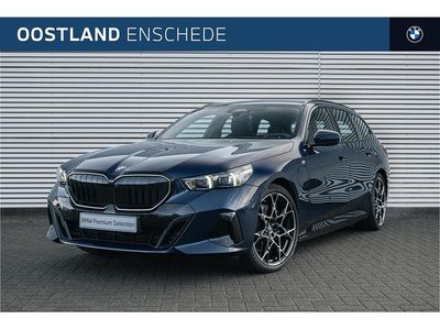 Blauw Occasion 2025 BMW 550e M Sport Stationwagen | € 87.950