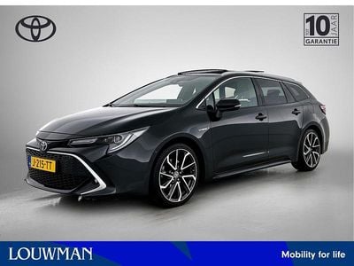 Zwart metallic Gebruikt 2020 Toyota Corolla Premium Stationwagen | € 24.900 (Eerlijke prijs)