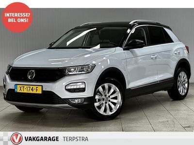 tweedehands VW T-Roc 1.5 TSI Style /150PK! /Camera /Trekhaak /Apple + Android /DAB+! /Navi /Climat /Adaptive Cruise /Elek. pakket /Bluetooth /Multi. LEDER Stuur /Regensensor /Armsteun /Isofix /17"LMV /PDC /Extra getint glas.